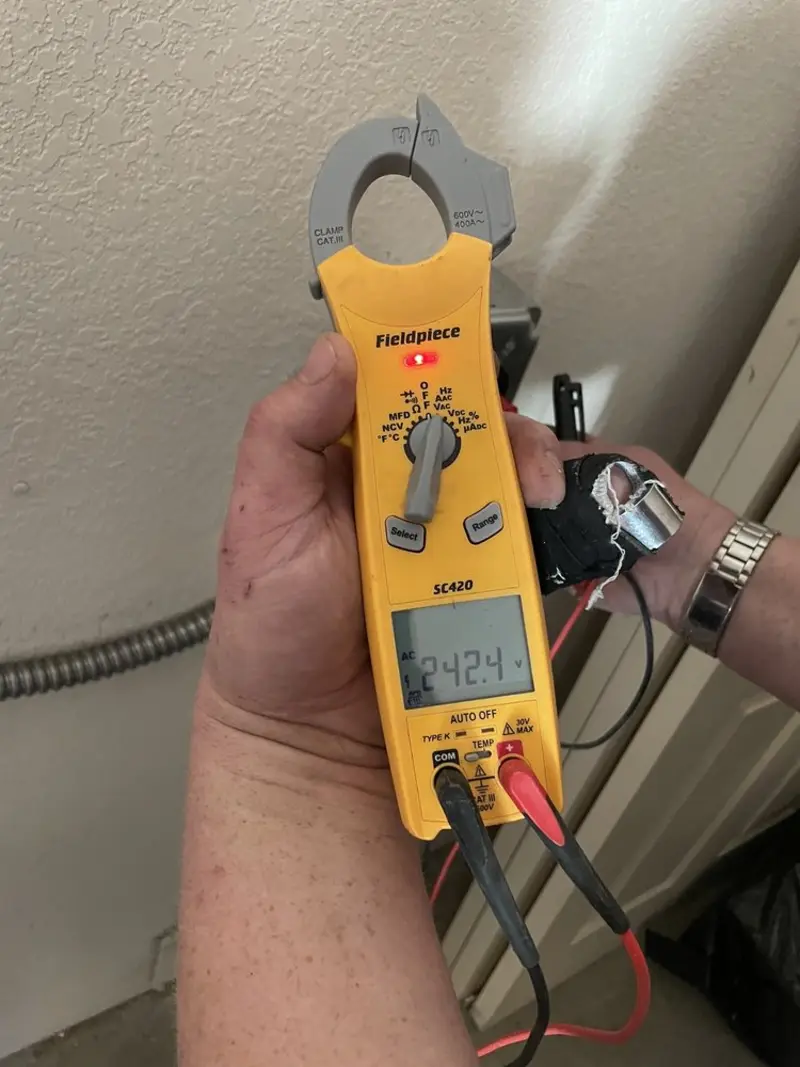 Voltage testing with clamp meter during Outlet Installation in Stillwater